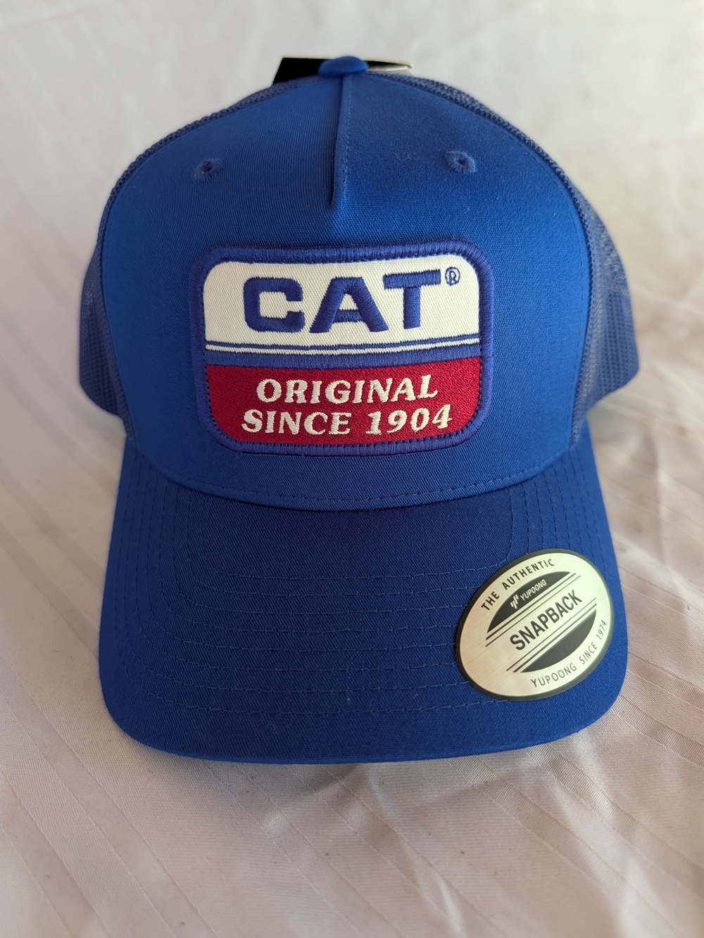 CAT Blue Original Since 1904 Trucker Snapback Hat